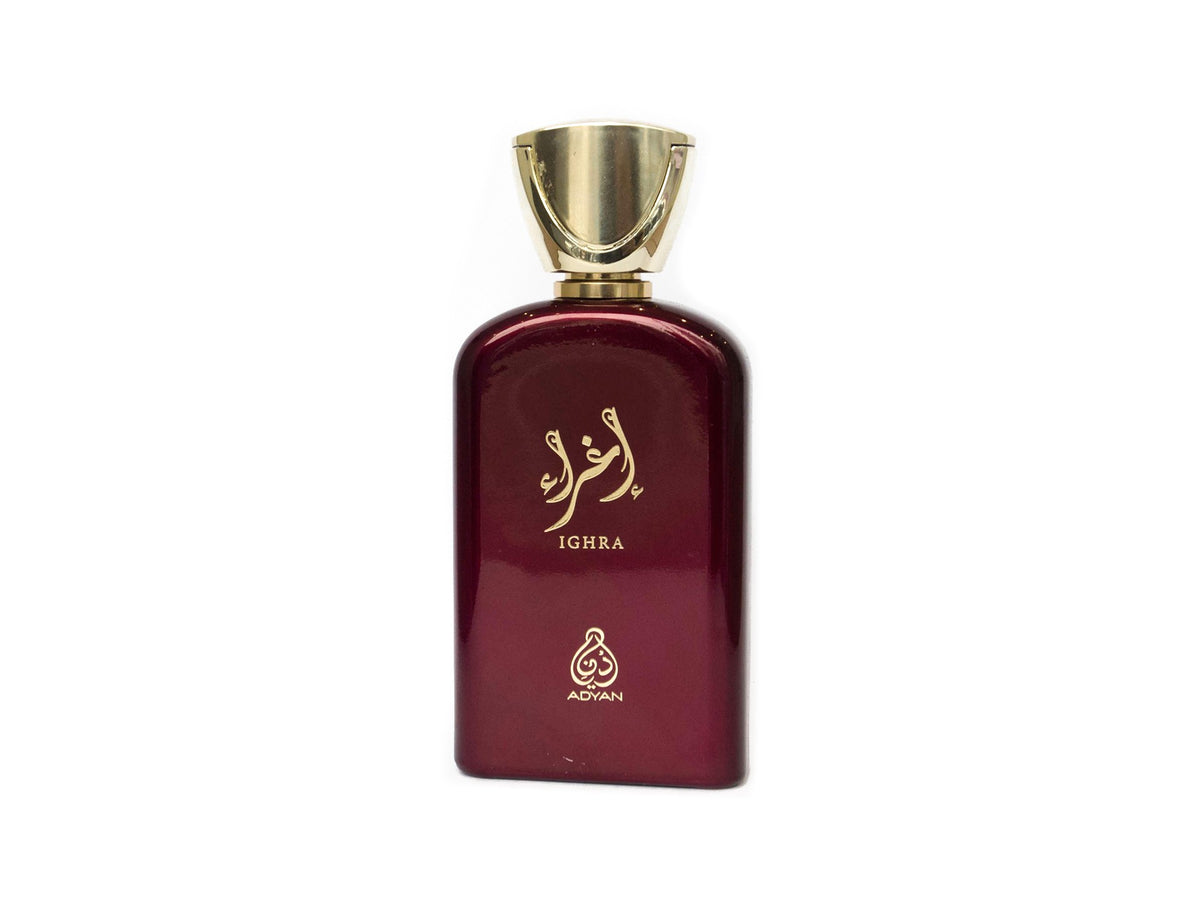 Burgundy Adyan Ighra perfume bottle featuring gold Arabic calligraphy and a gold flared cap.