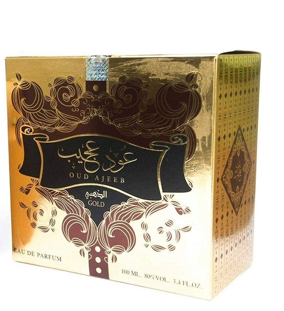 Gold and maroon Oud Ajeeb Gold Eau de Parfum box with ornate scrolling patterns and Arabic calligraphy.