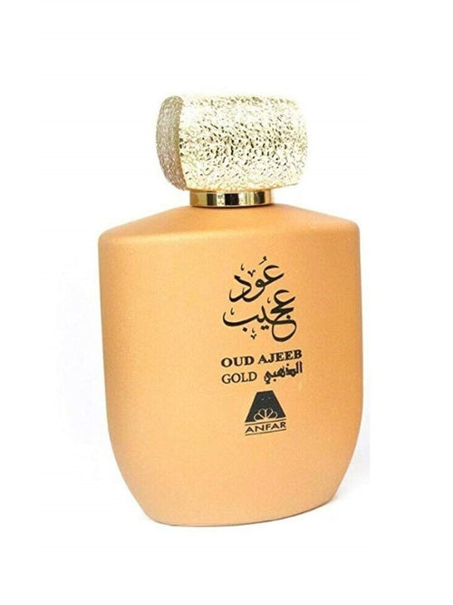Anfar Oud Ajeeb Gold perfume bottle in matte peach with a textured gold cap and Arabic calligraphy.