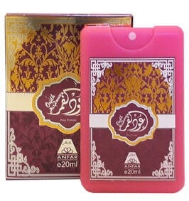 Anfar Oudh Al Qamar Pour Femme 20ml pocket spray in a pink case next to its maroon and gold decorative box.