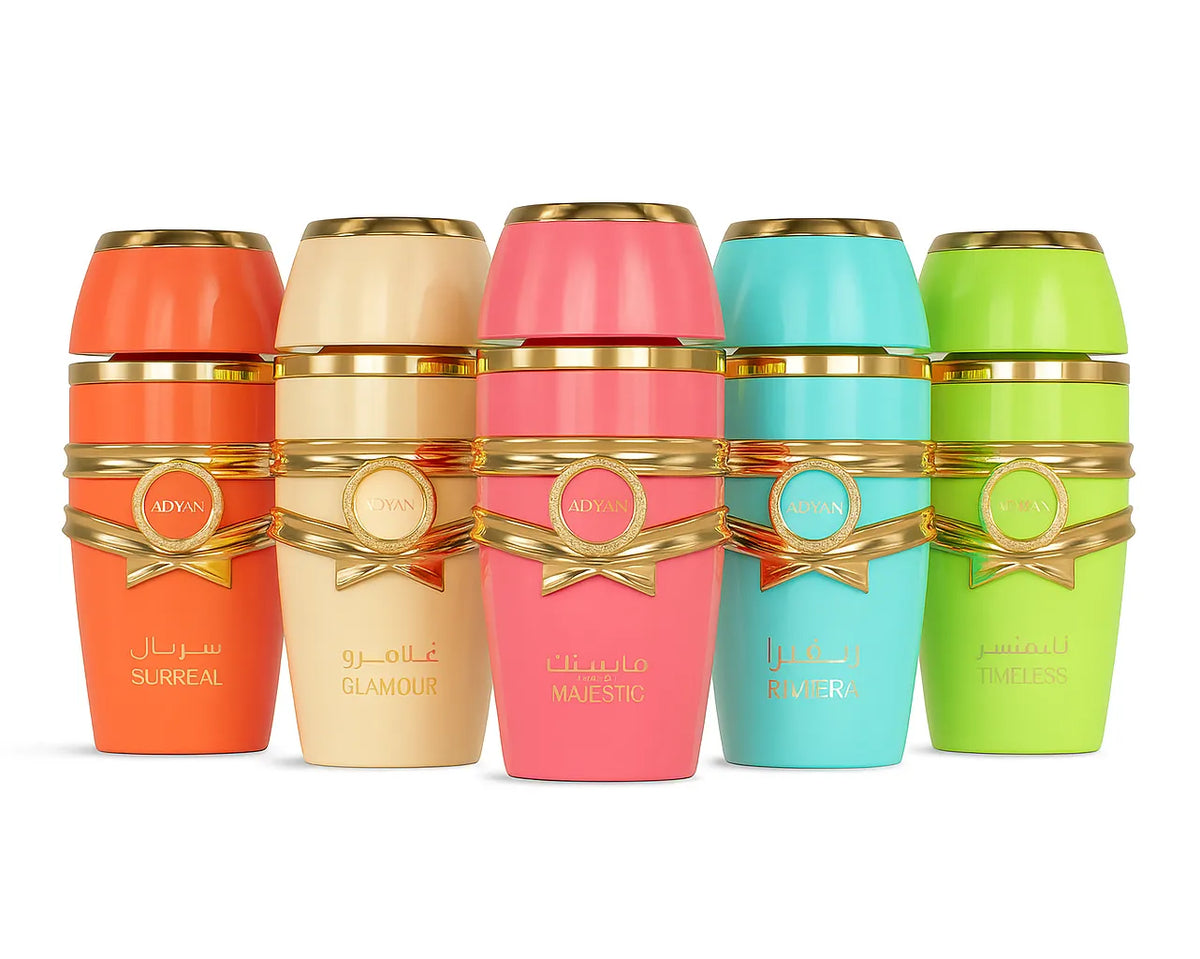 Five colorful Adyan perfume bottles: Surreal, Glamour, Majestic, Riviera, and Timeless with gold accents