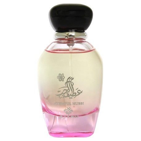 Atifatul Hubbi by Ajyad perfume bottle featuring pink gradient glass and a large black bulbous cap.
