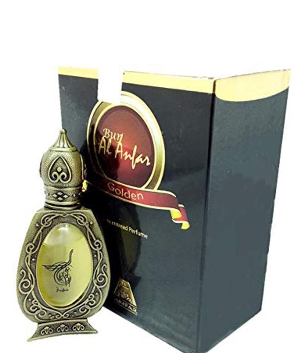 Burj Al Anfar Golden perfume oil in an ornate bronze bottle next to its black and gold packaging box.