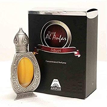 Al Anfar Silver Concentrated Perfume: An ornate silver bottle with amber liquid next to its black and silver box.