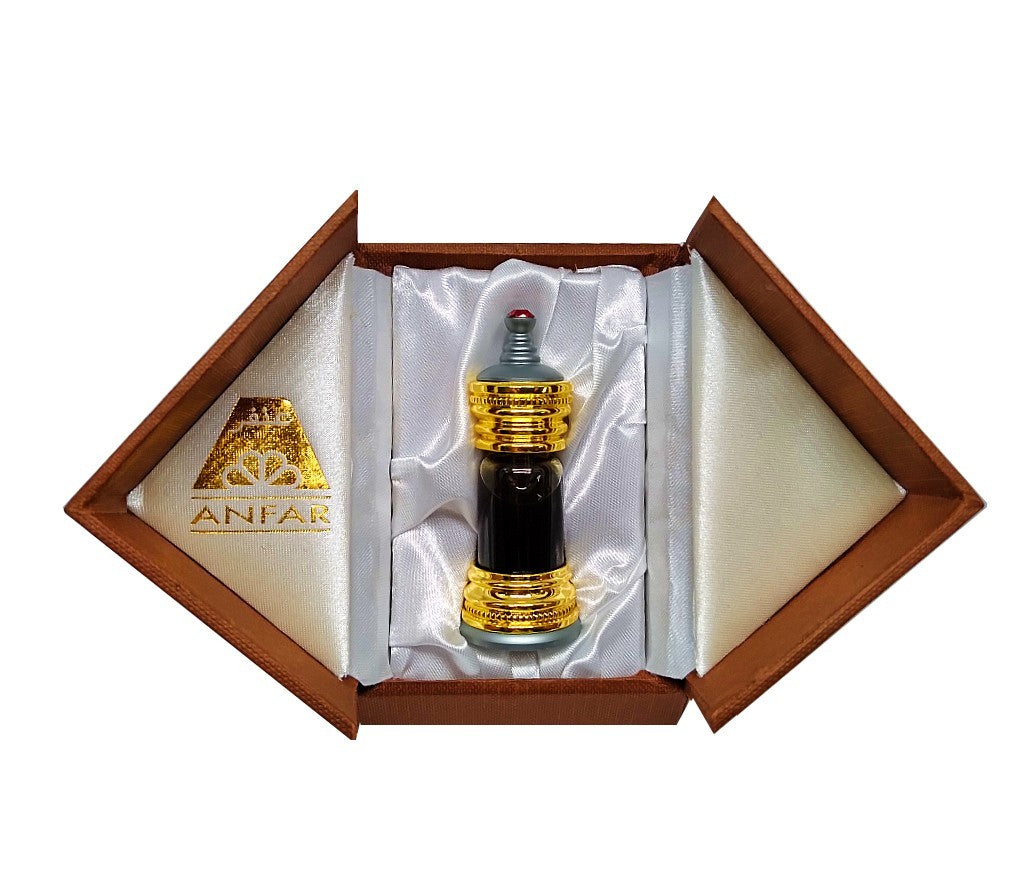 Ornate gold and silver Anfar perfume bottle in a white satin-lined brown gift box.
