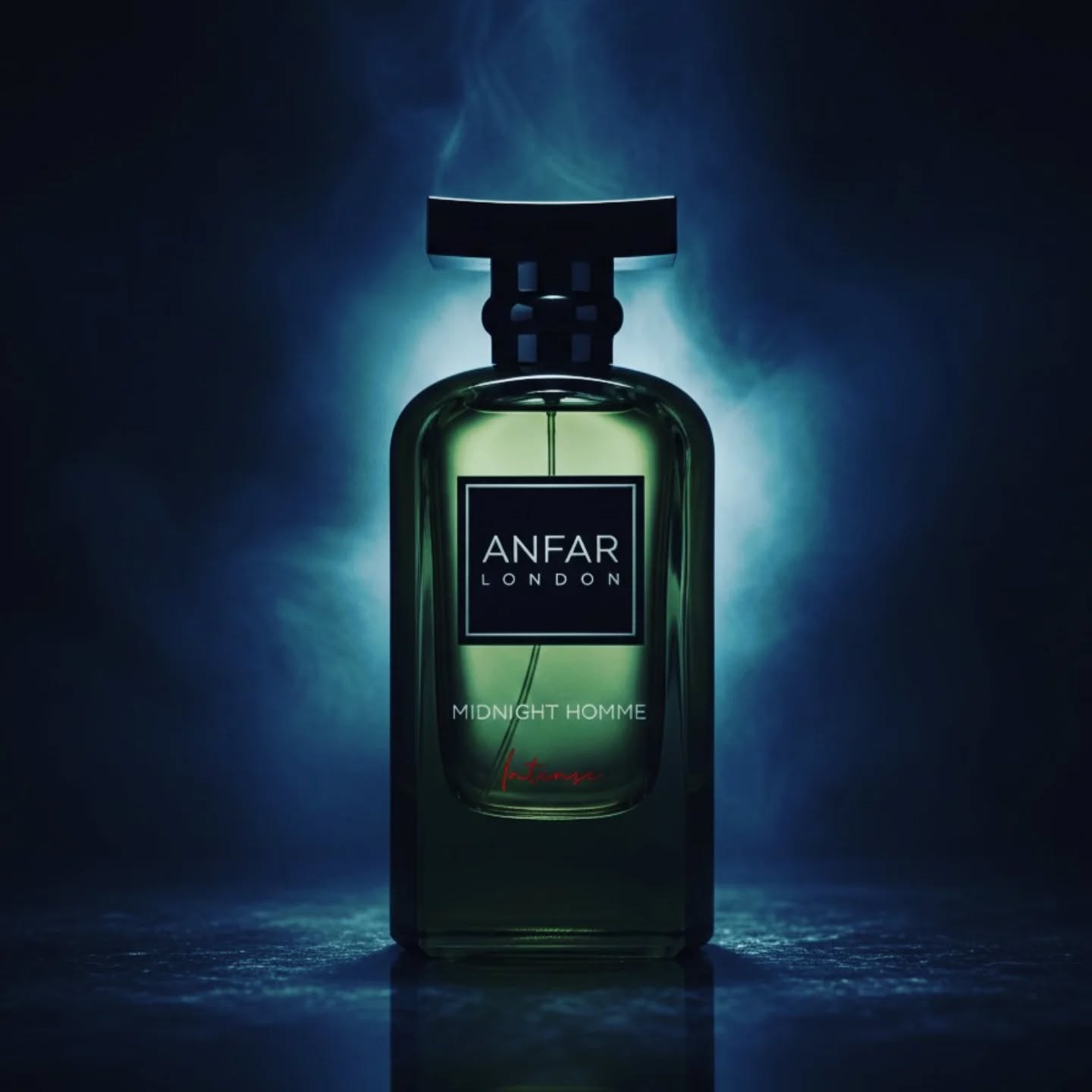Anfar London Midnight Homme cologne bottle in dark green glass against a smoky blue background.