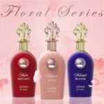 Adyan Floral Series: red Mystic Melody, pink Majestic Aura, and purple Midnight Bloom perfumes in ornate bottles.