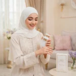 Woman wearing Wujood Rose Poudre powdery vanilla perfume
