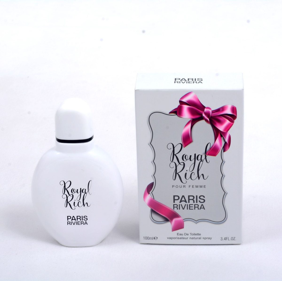 Royal Rich by Paris Riviera perfume bottle and box for women, featuring a white bottle and pink bow design.